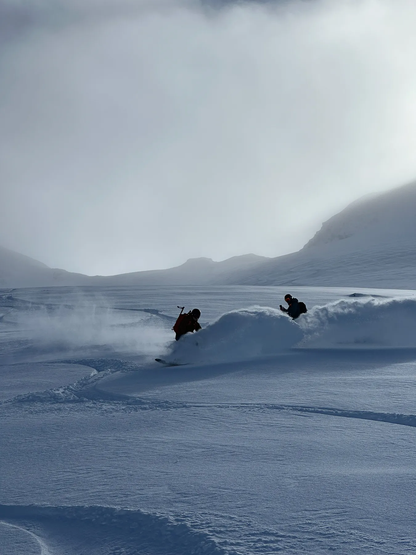 Snowboarding down Tromso peaks